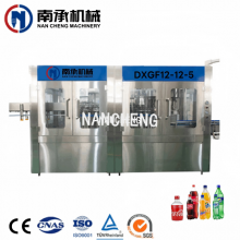  2000-30000瓶/小時(shí)全自動(dòng)飲料/碳酸飲料/CSD清洗灌裝旋蓋三合一機(jī)（型號(hào)：DXGF12-12-5)